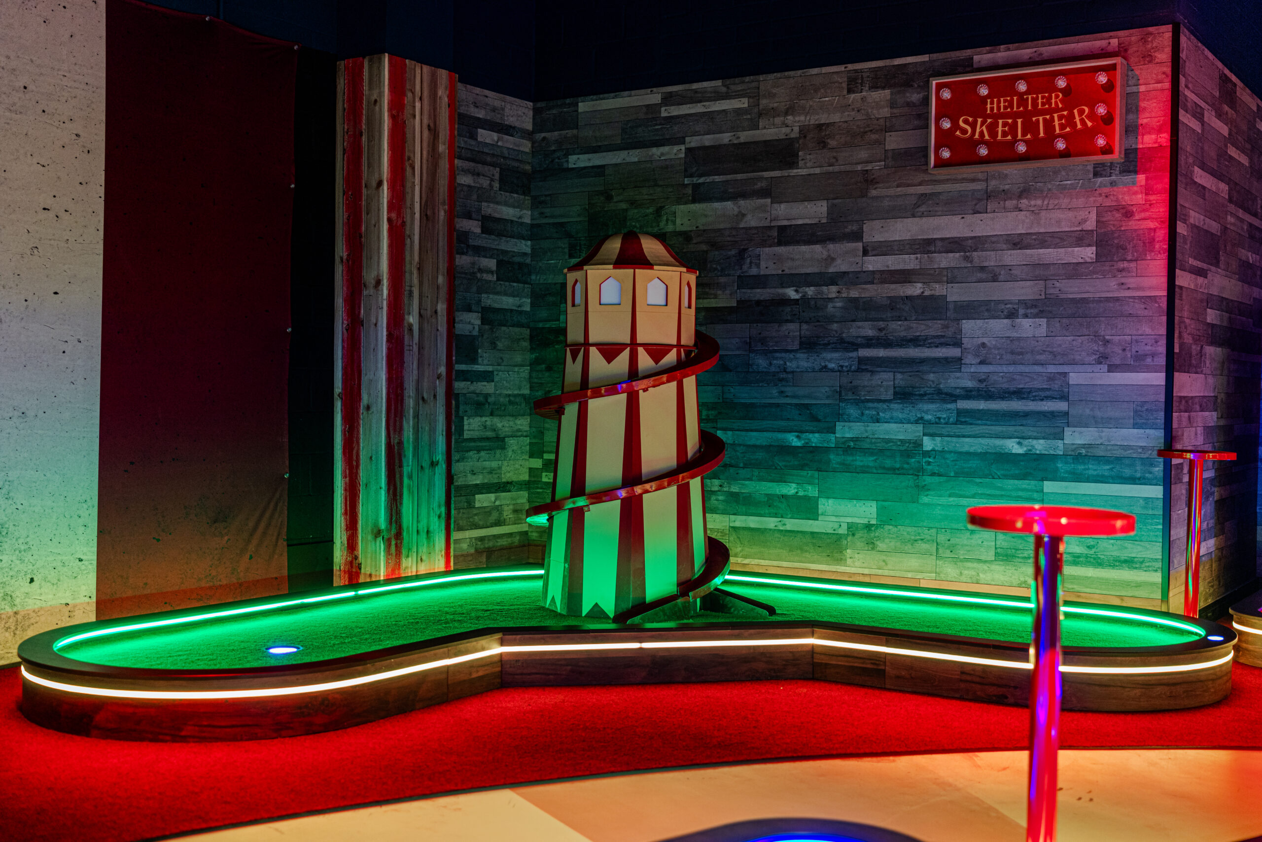 Full view of a themed miniature golf course, showcasing commercial bespoke joinery and custom installation by Driftwood NI