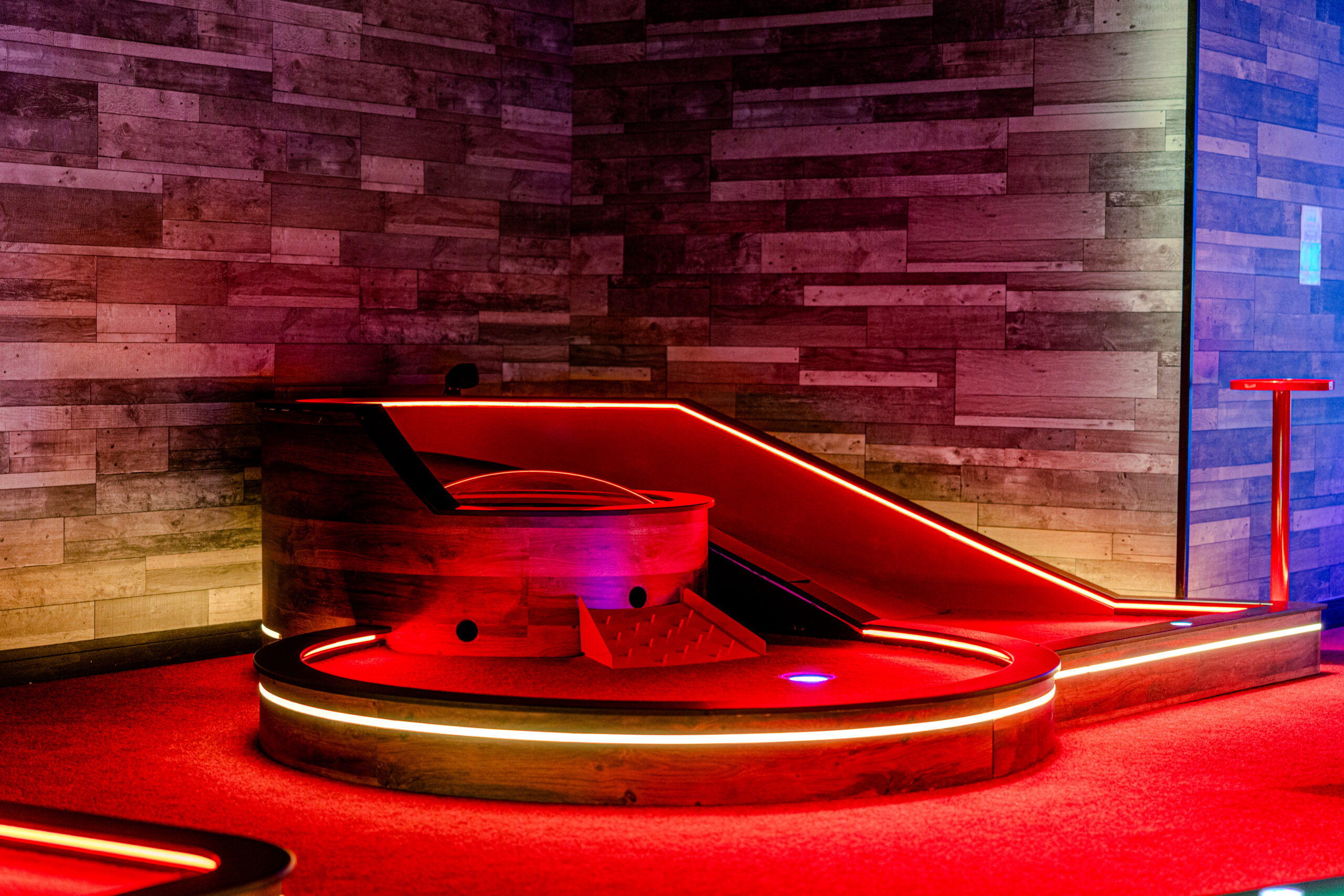 Full view of a themed miniature golf course, showcasing commercial bespoke joinery and custom installation by Driftwood NI