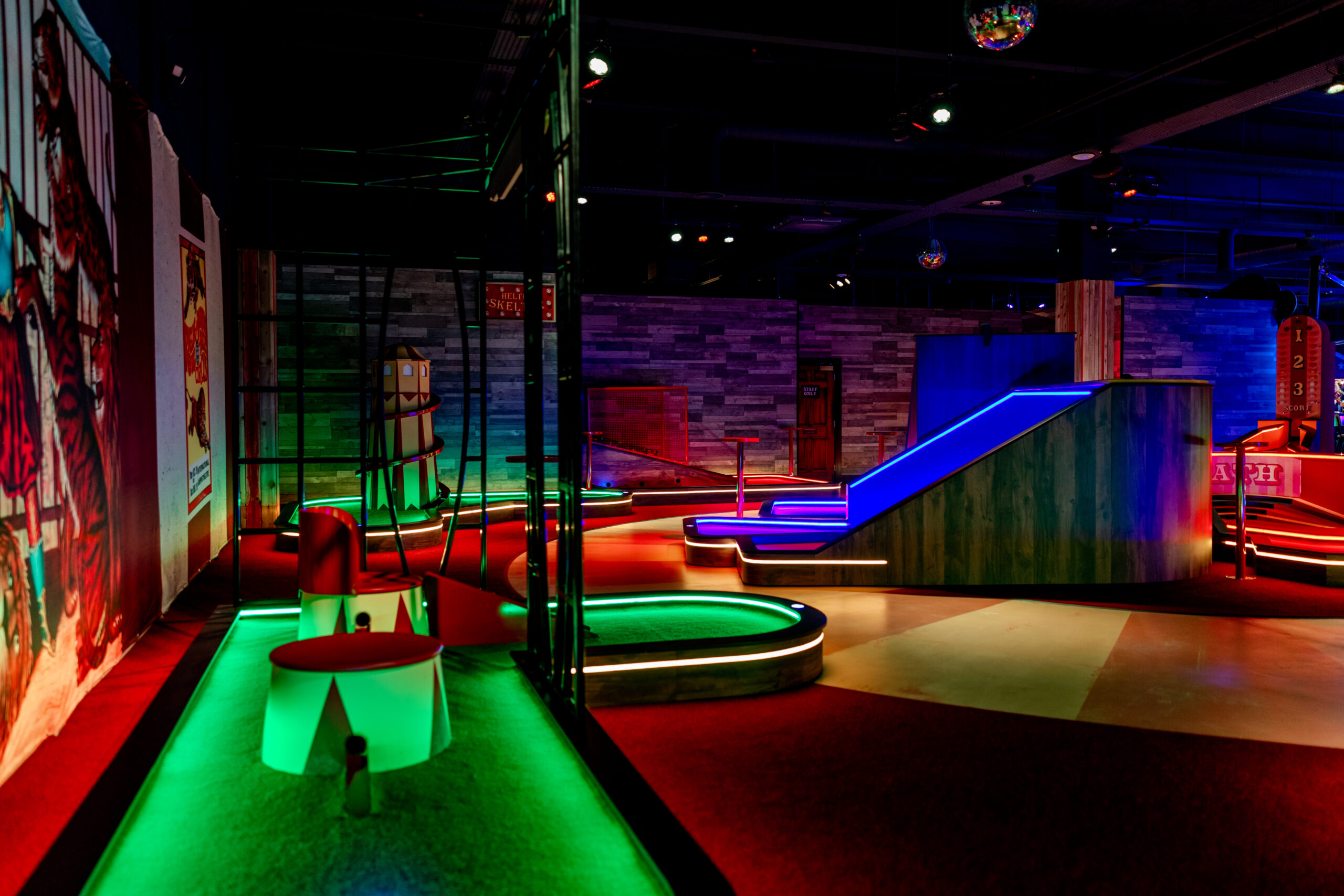 Full view of a themed miniature golf course, showcasing commercial bespoke joinery and custom installation by Driftwood NI