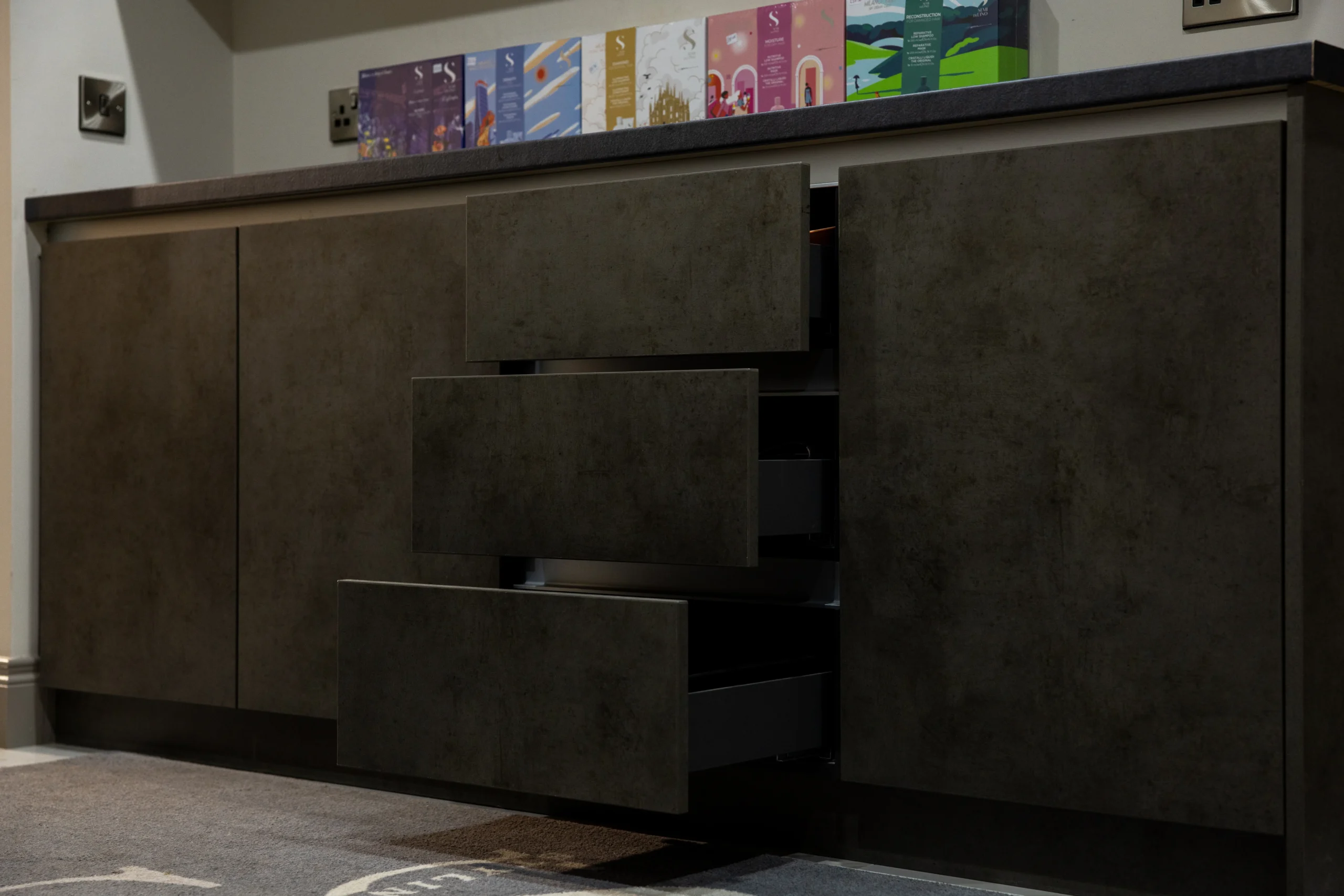 Salon interior joinery detail with integrated storage, shelving and lighting-ready features